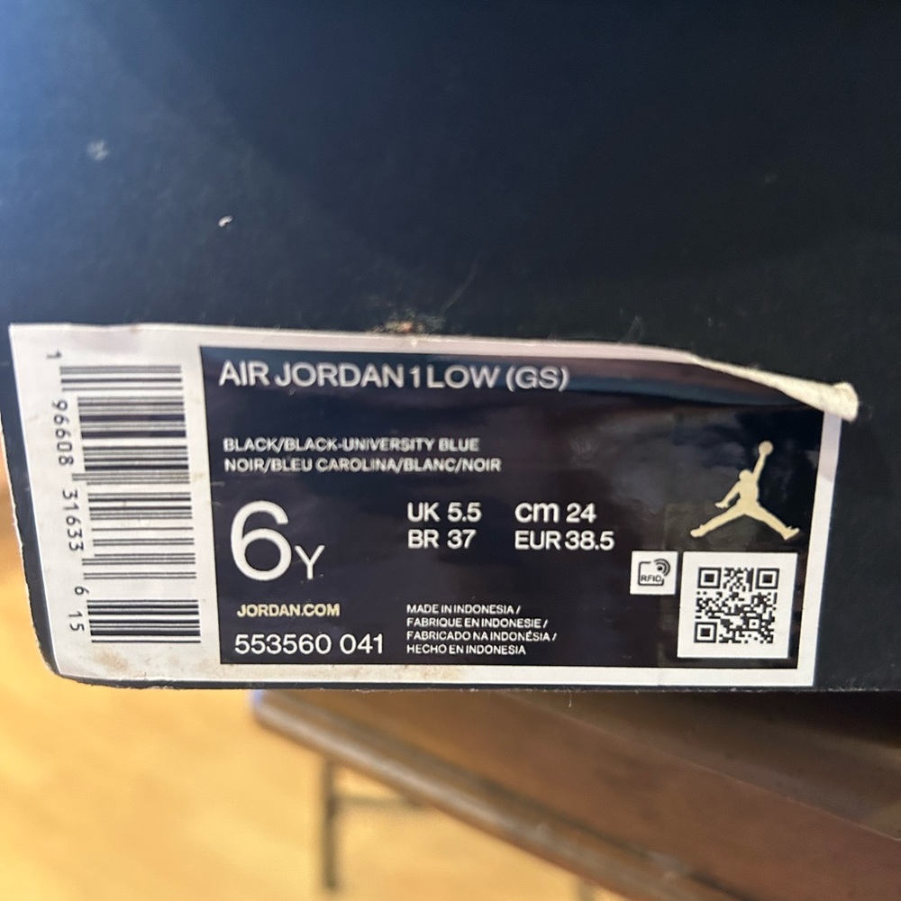 Air Jordan 1 Low GS Black and University Blue Sneakers